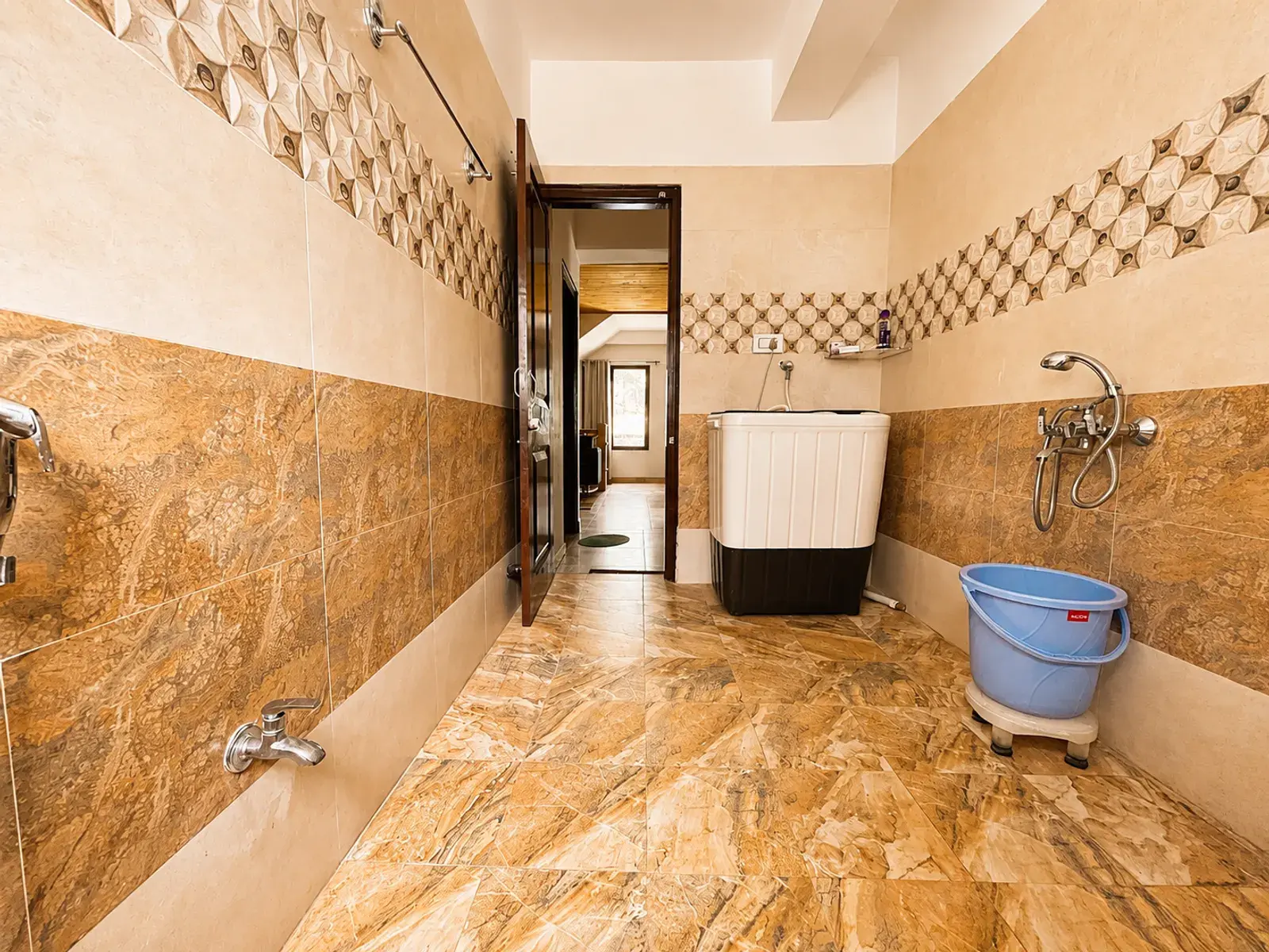 Bathroom 3 view toward the door at Noon Villa